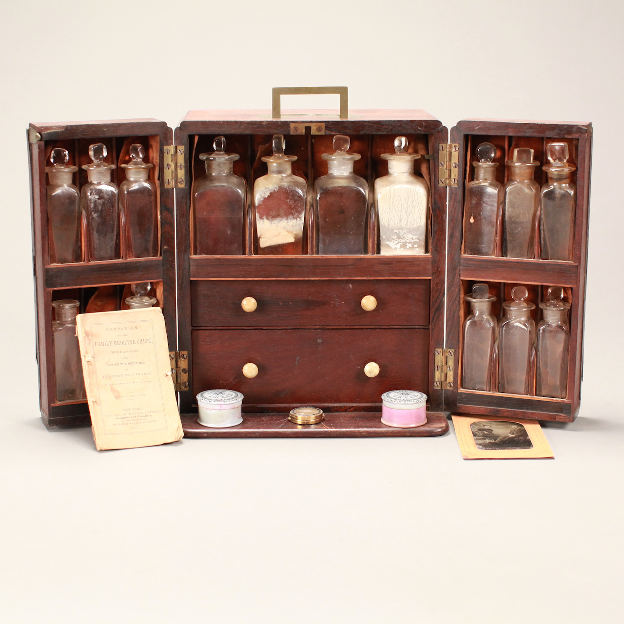 LOT 047 MAHOGANY DOCTOR’S TRAVELING APOTHECARY CHEST “FAMILY MEDICINE
