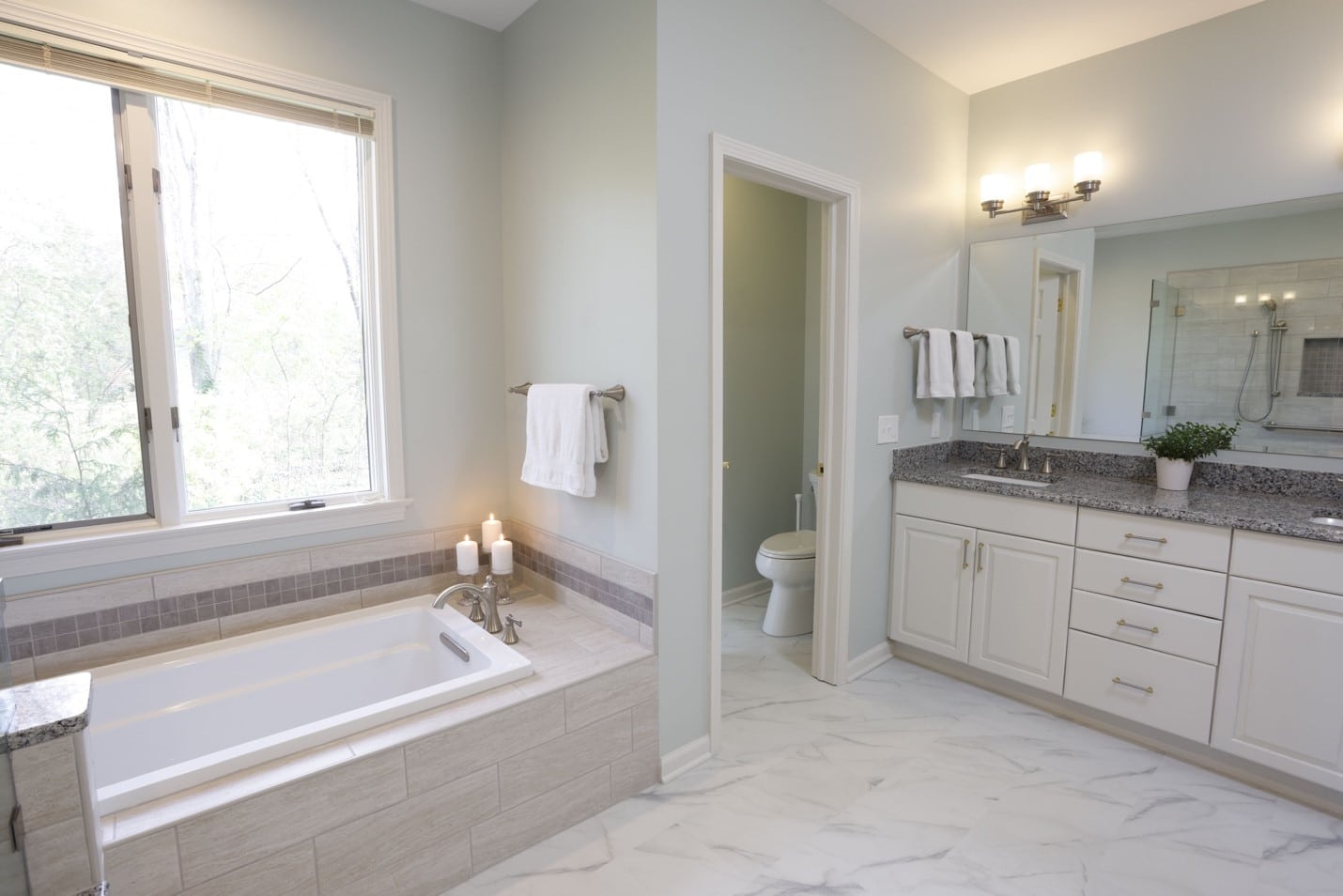 CLEVELAND HOME DESIGN & REMODELING Primary Bathroom Renovation With