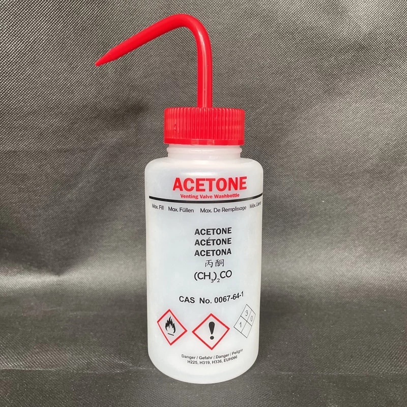 Empty wash bottle for distilled water , acetone , methanol , ethanol