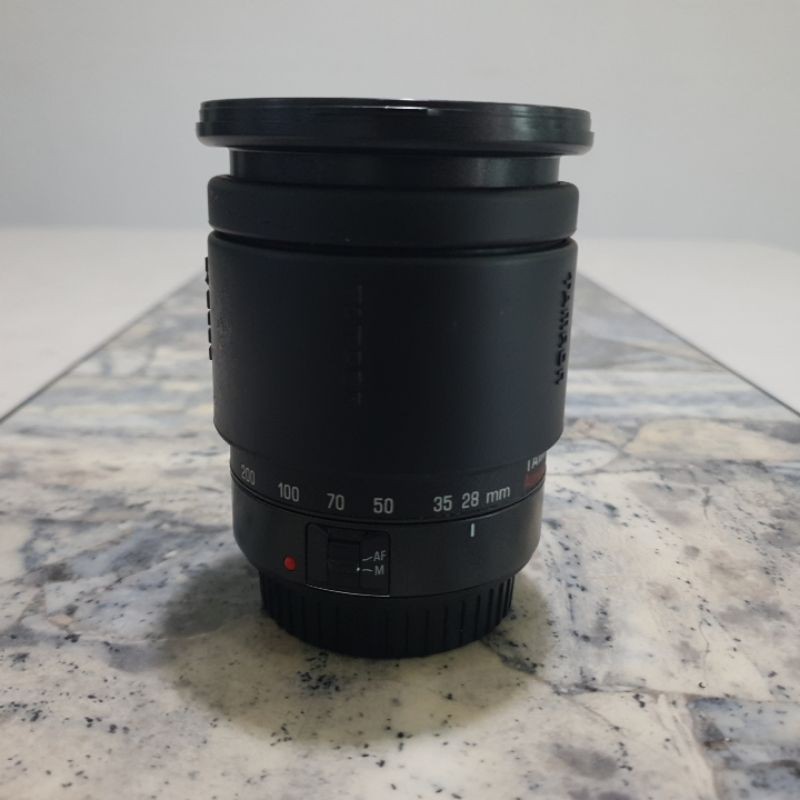 Used lens Tamron 28200mm Canon Mount. 1 month warranty. Made in Japan