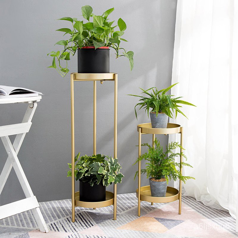 Gold Flower Stand Sofa TV next to Large Floor Ornaments Living