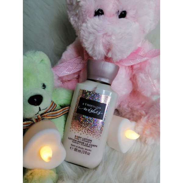 BATH AND BODY WORKS MINI LOTION WARM VANILLA SUGAR AND A THOUSAND