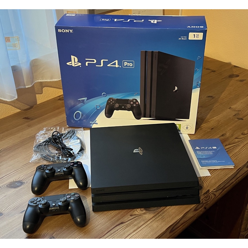 Sony PlayStation 4 Pro 1TB CUH7016B with 2 Orig. controllersExcellent