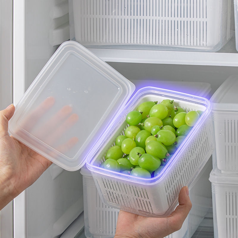 Fresh Fruit And Vegetable Storage Box In The Refrigerator With A Drain