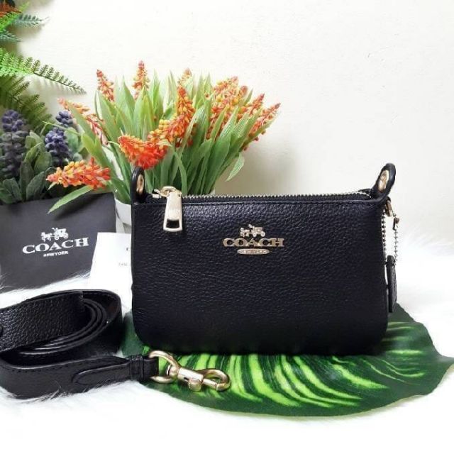 กระเป๋าสะพาย COACH JES CROSSBODY WITH SIGNATURE CANVAS STRAP Shopee