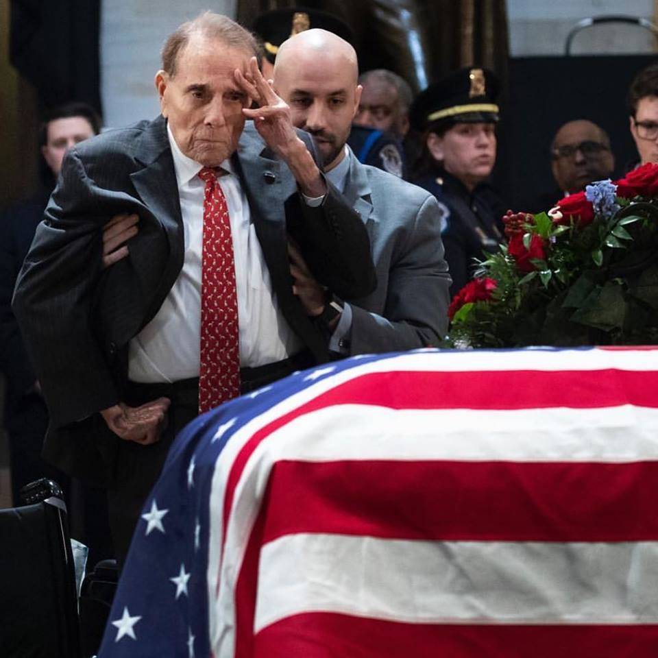 Bob Dole Stands Up From Wheelchair To Salute H.W. Bush
