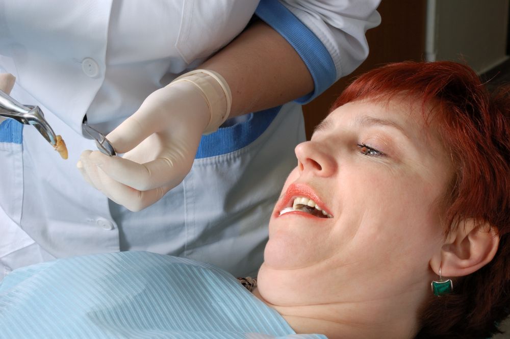 What To Know About Tooth Extraction Pain? Dr. Alex Midtown NYC