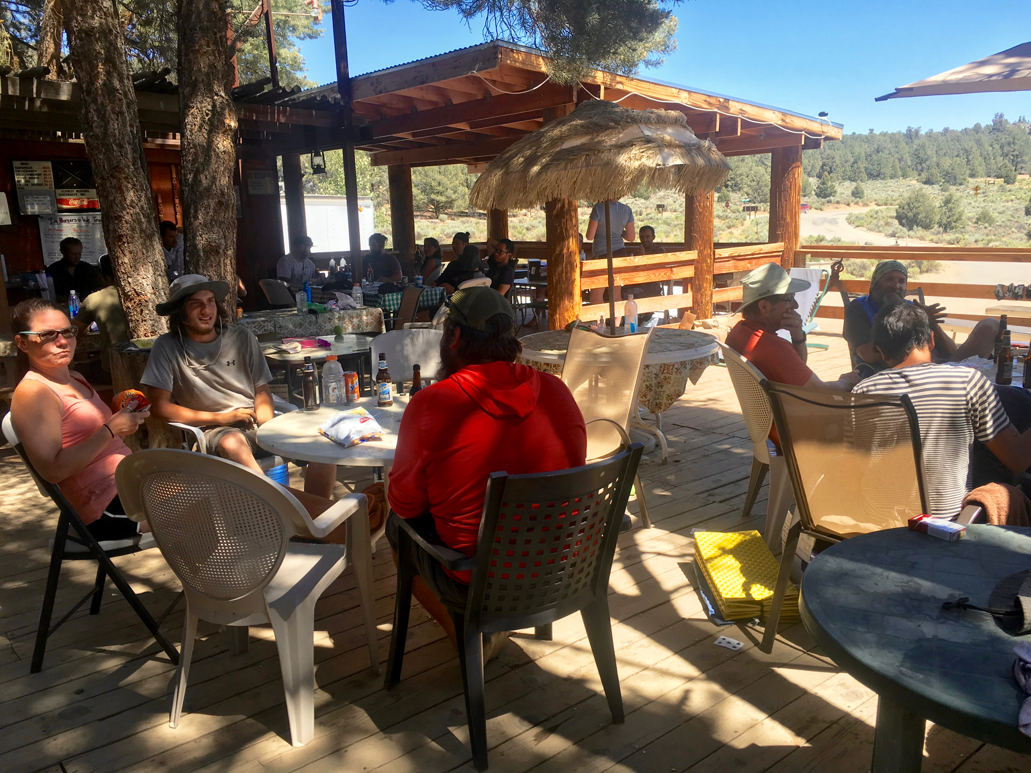 Hikers hanging out at Kennedy Meadows Store Walking to the light