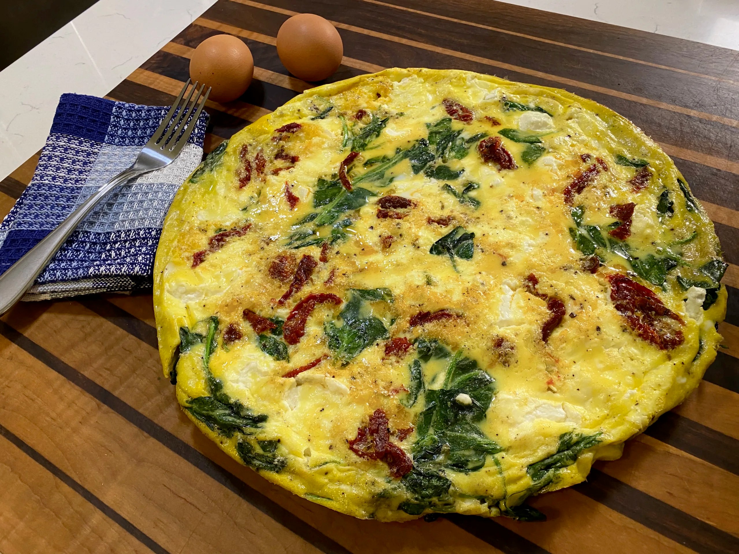 Elevated FRITTATA with Goat Cheese, SunDried Tomato, and Spinach