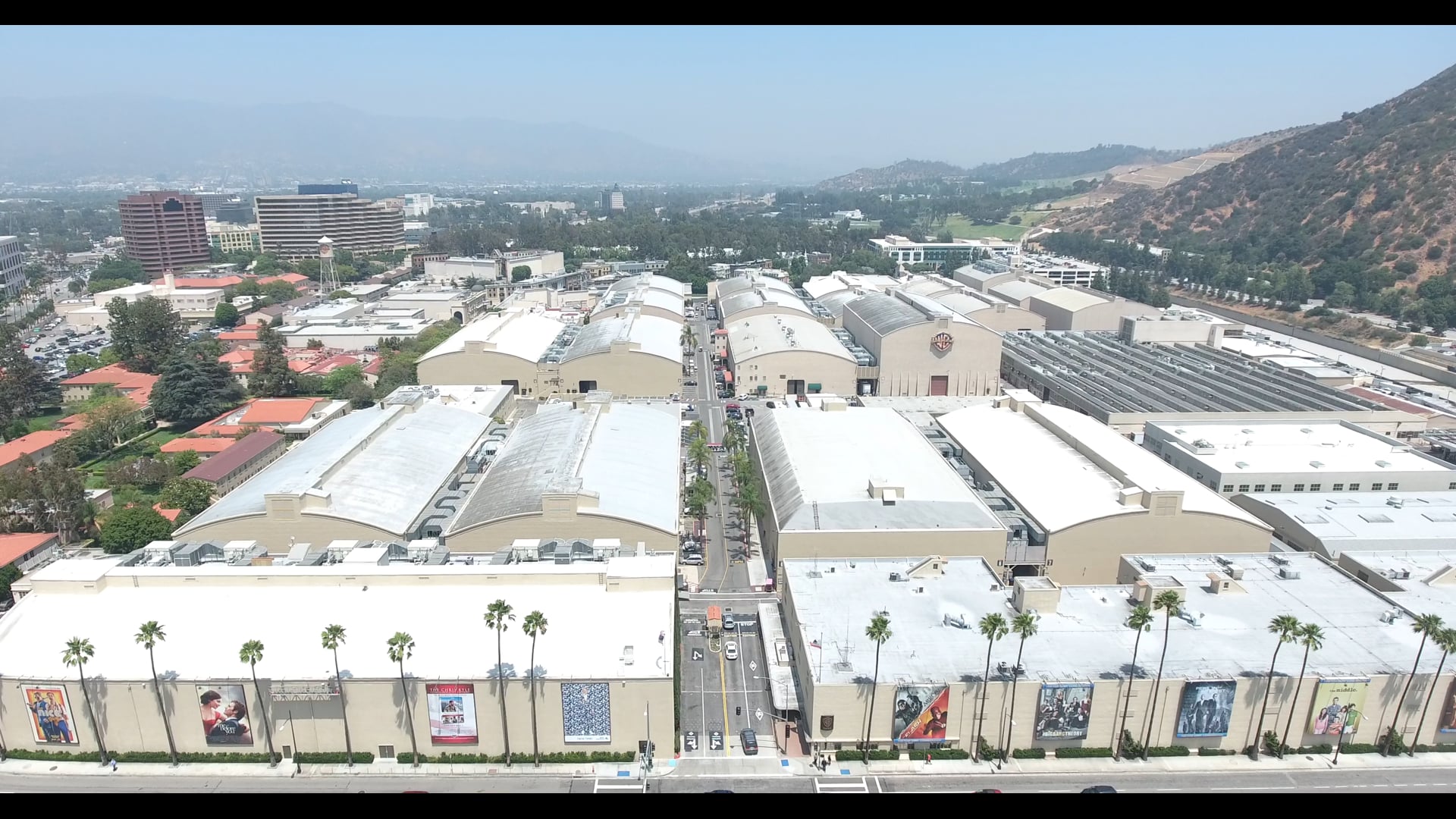 Aerial Drone Footage of Warner Bros. Studio Parking Lot and Stage Buildings