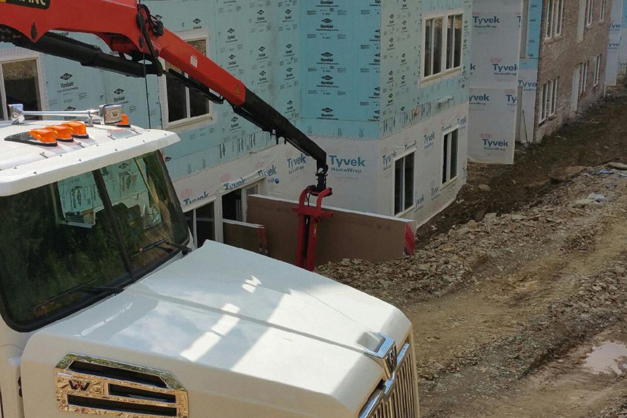 Drywall Barn Boom Truck Delivery Lower Level Drywall Barn