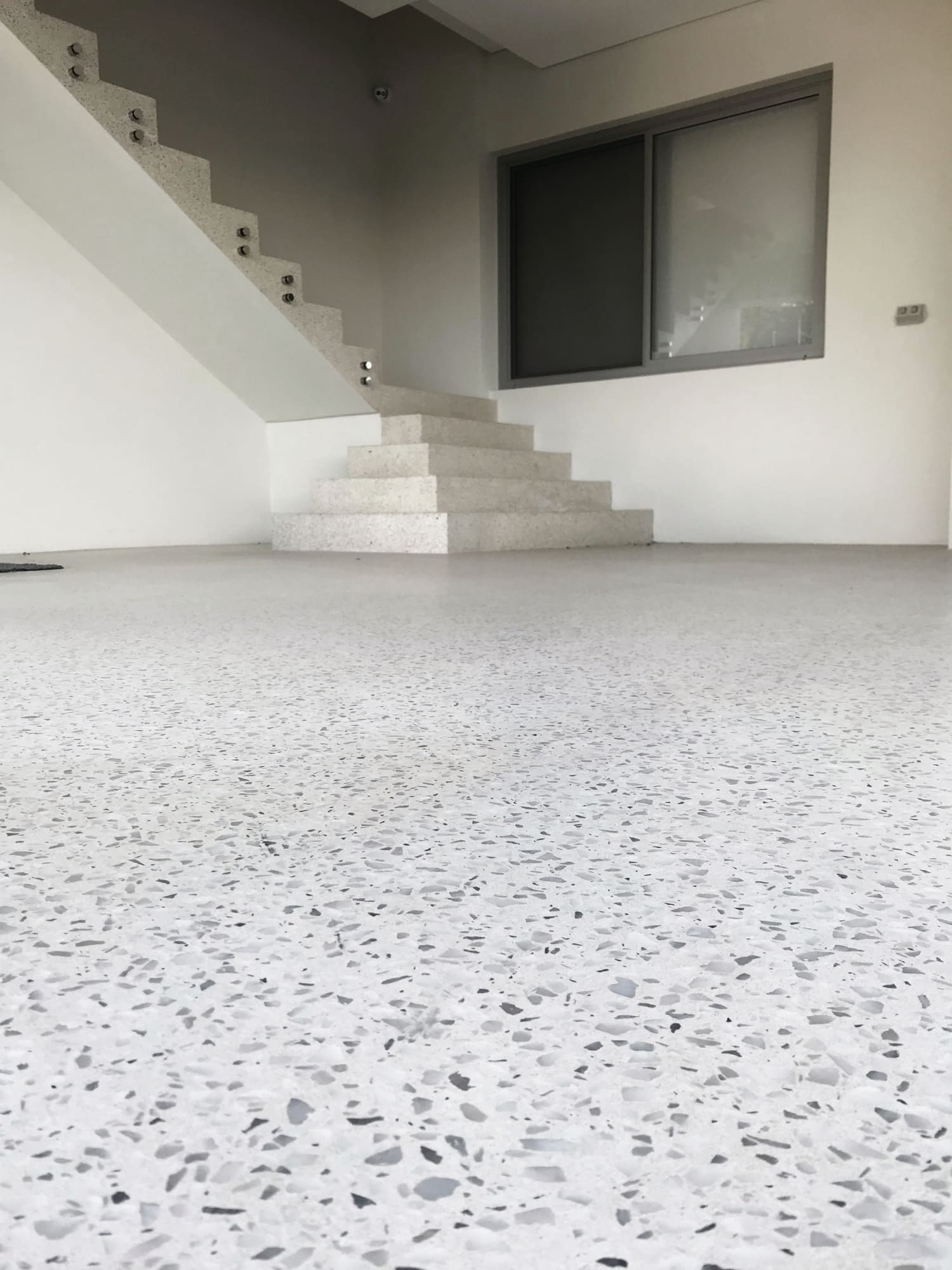 Seamless White Concrete Flooring Project Award Winner DS Grinding