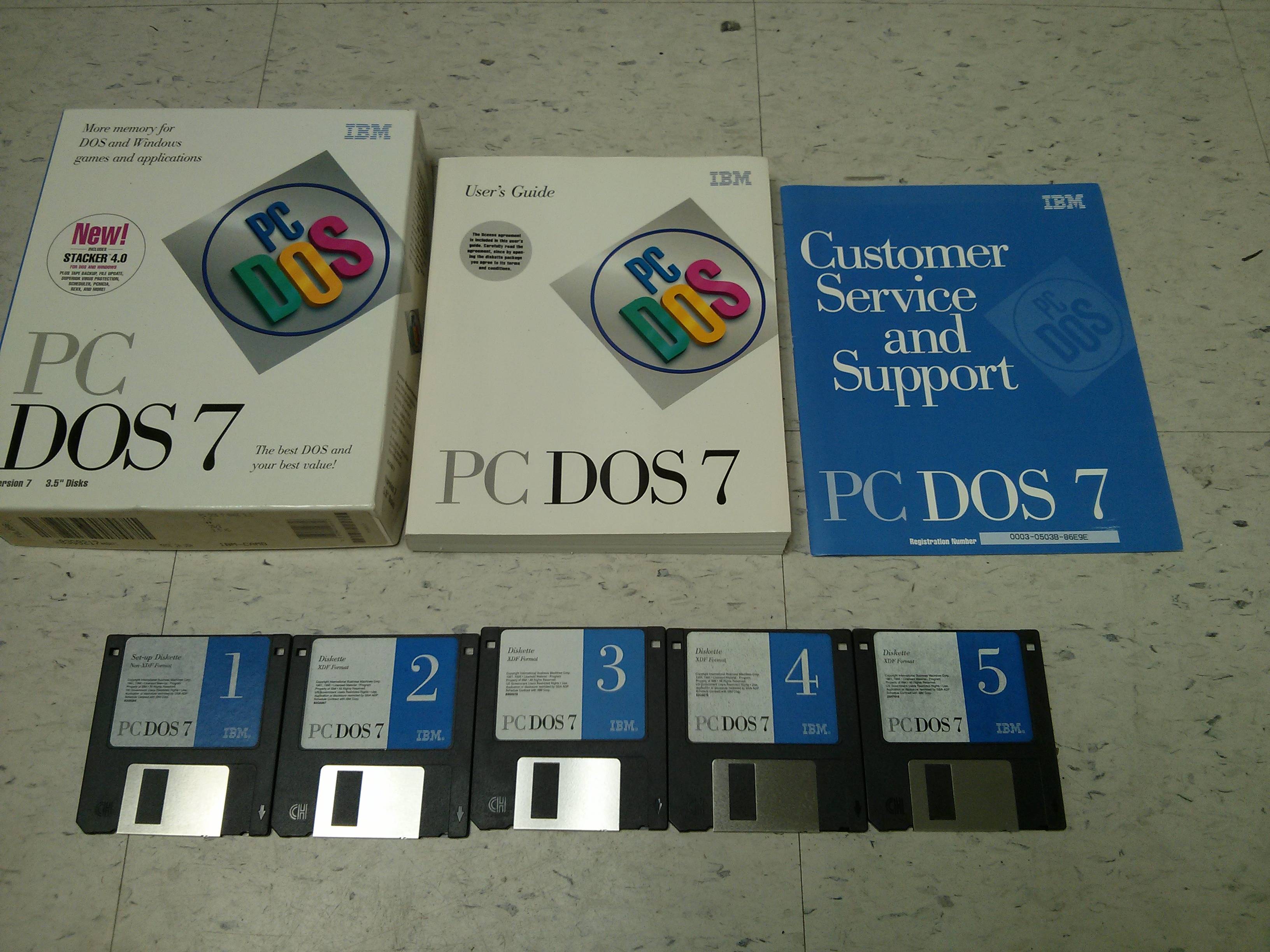DOS installation floppy disks and manuals — nostalgia, anyone? [Image