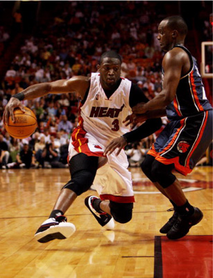 Dwyane Wade drives on defender
