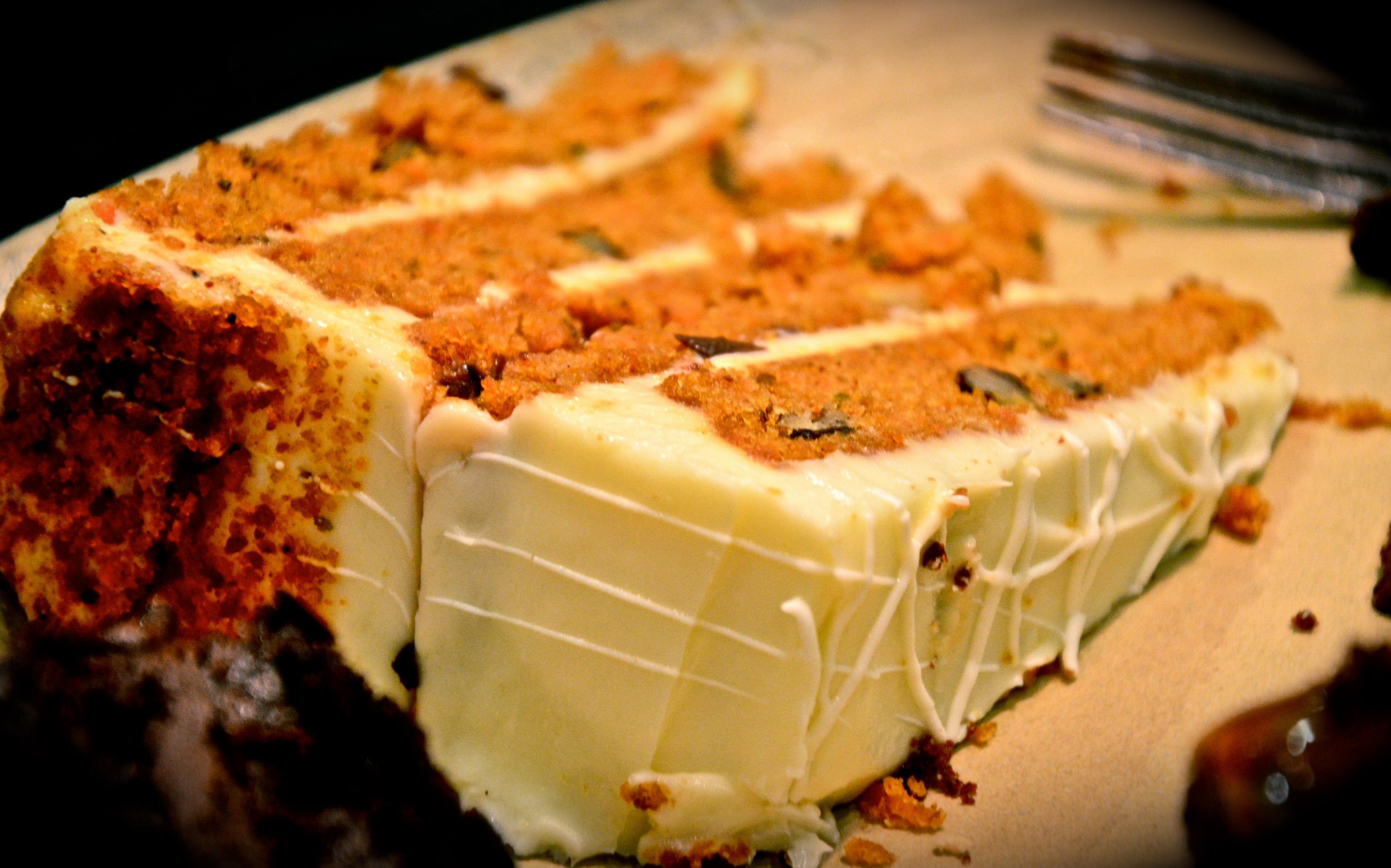 Four High Carrot Cake Dhs 26 Layered moist carrot cake, studded with raisins, walnuts and