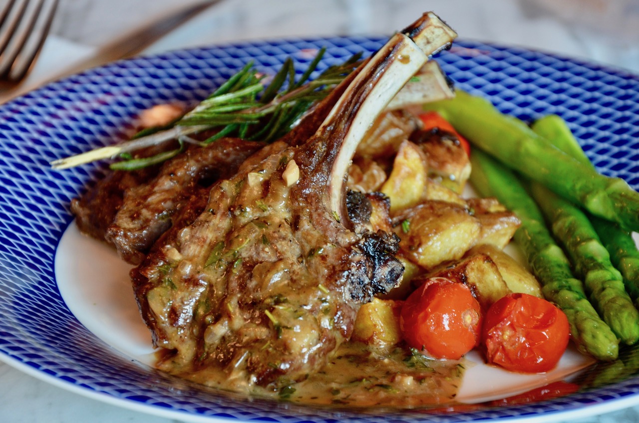 Char Grilled Lamb chops served with rosemary potatoes, asparagus and