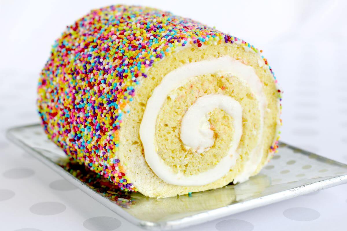 A Vision in Sprinkles Sprinkle Cake Roll Dutch Apron® Bakery