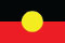 Aboriginal flag, black top half, red lower half, with a yellow disc in the middle