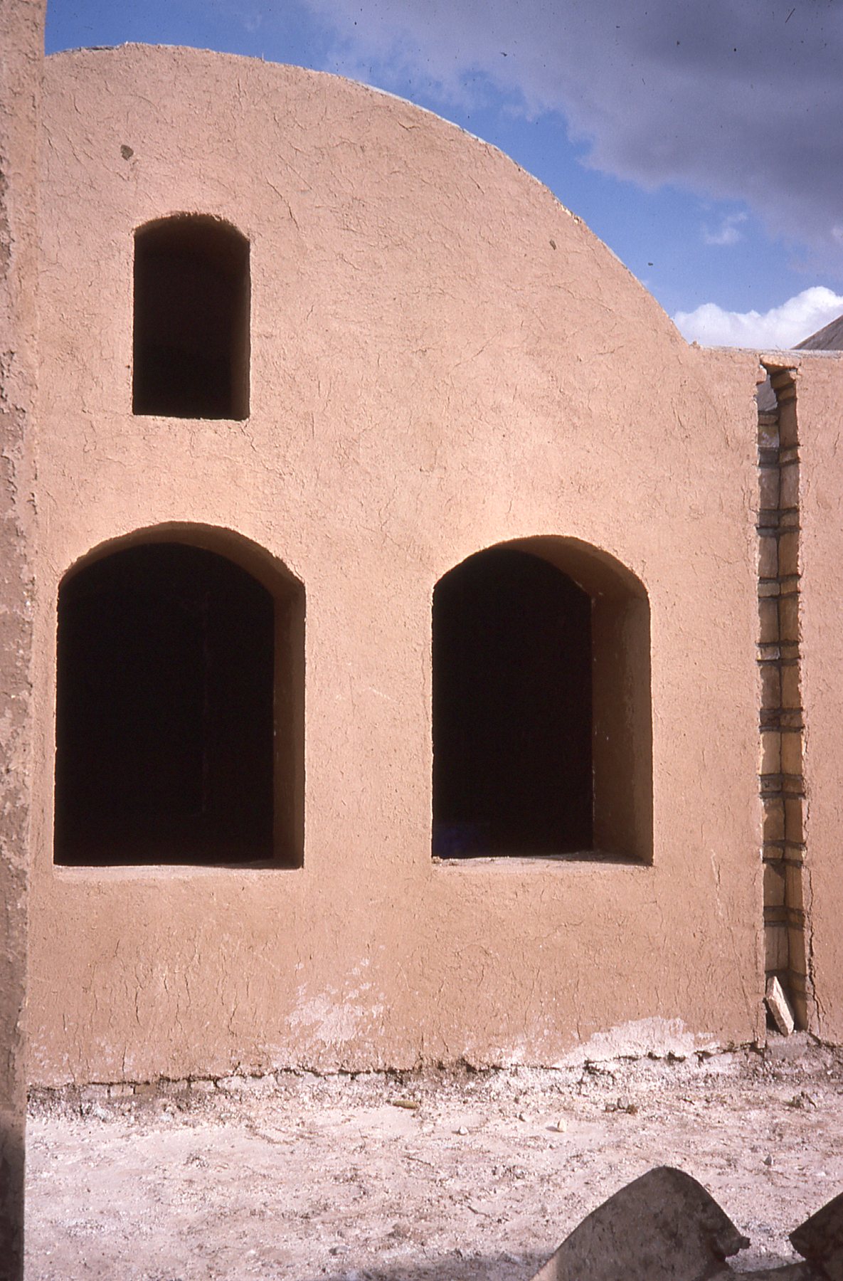 Ceretakai's house; exterior; smooth mud brick building under