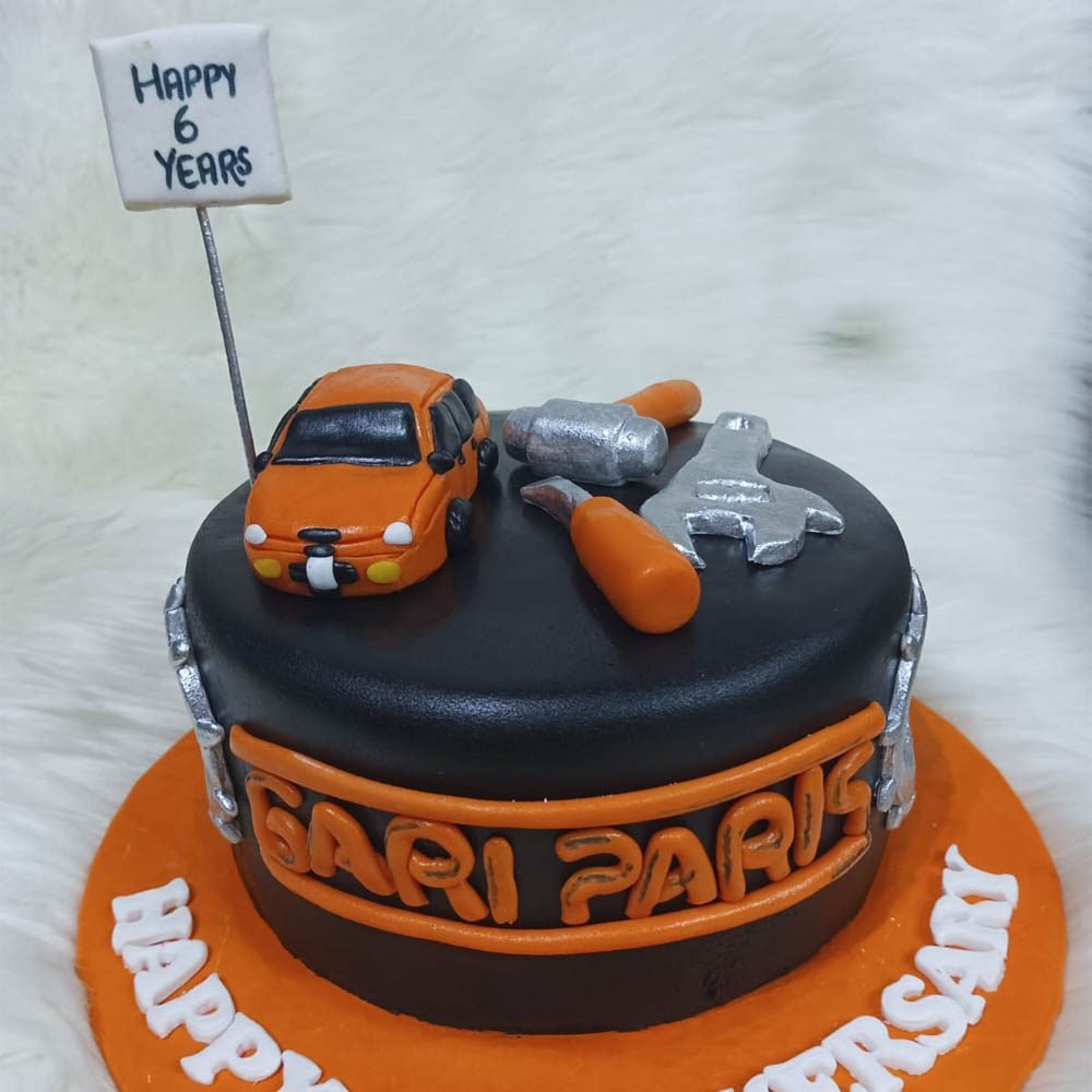 Car theme cake in Karachi Car mechanic cake Dynacakes