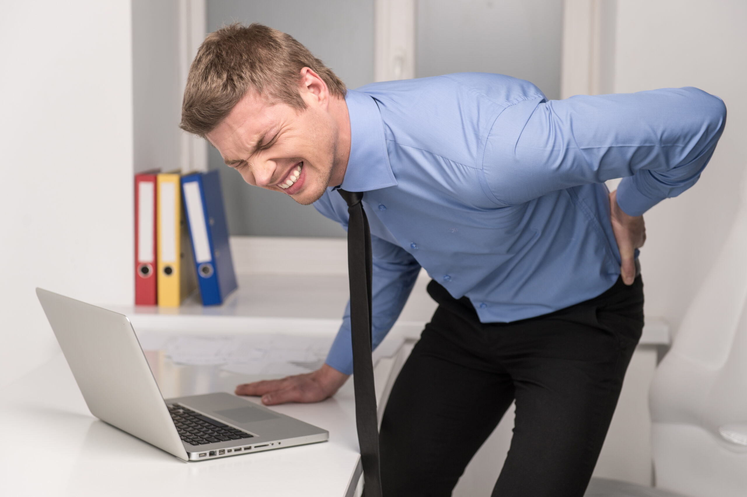 Why Does My Back Hurt At the Office Desk? Dynamic Health Fitness