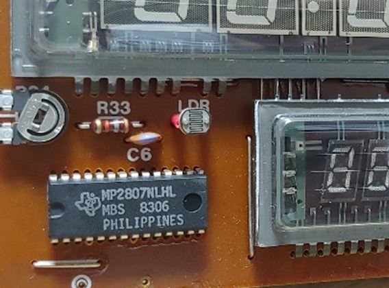 Looking for a datasheet for an old MP2807NLHL Digital Alarm Clock IC