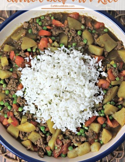 A plate of food with rice meat and vegetables