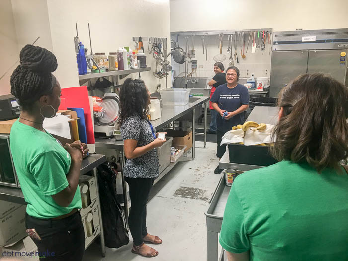 A group of people in a kitchen