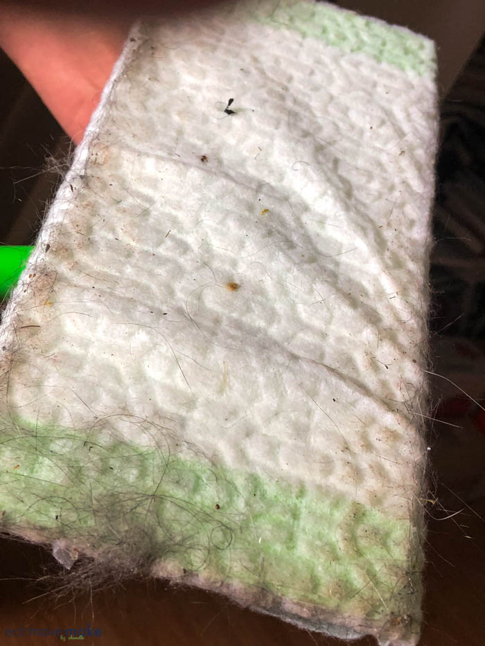 A close up of a dirty Swiffer pad
