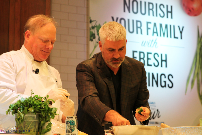 A couple of people cooking
