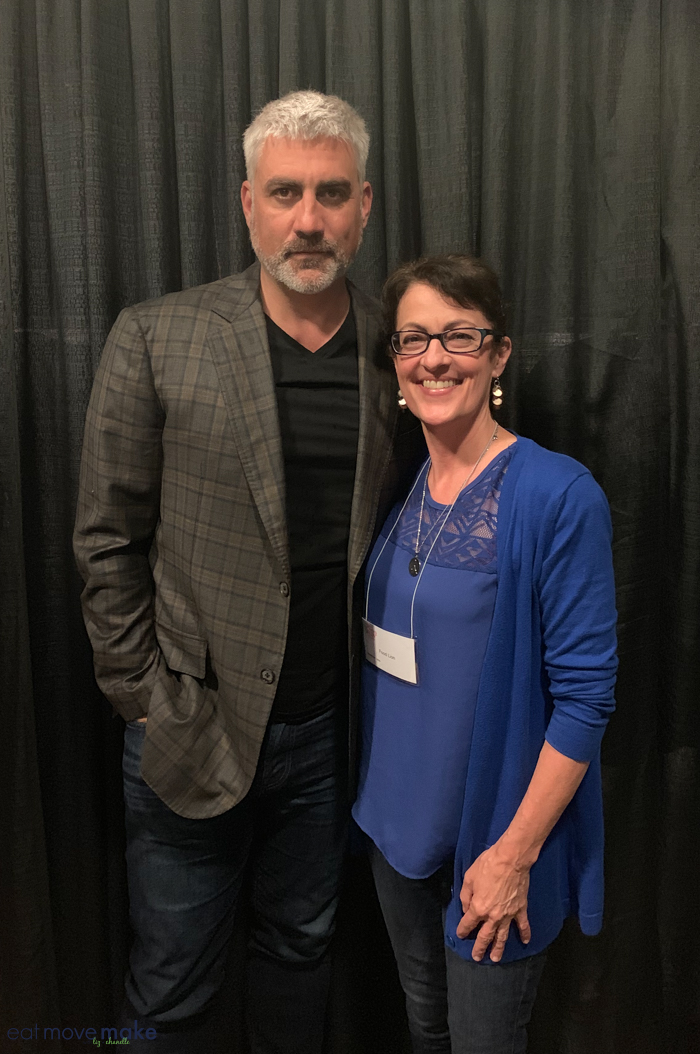 Taylor Hicks standing in front of a curtain