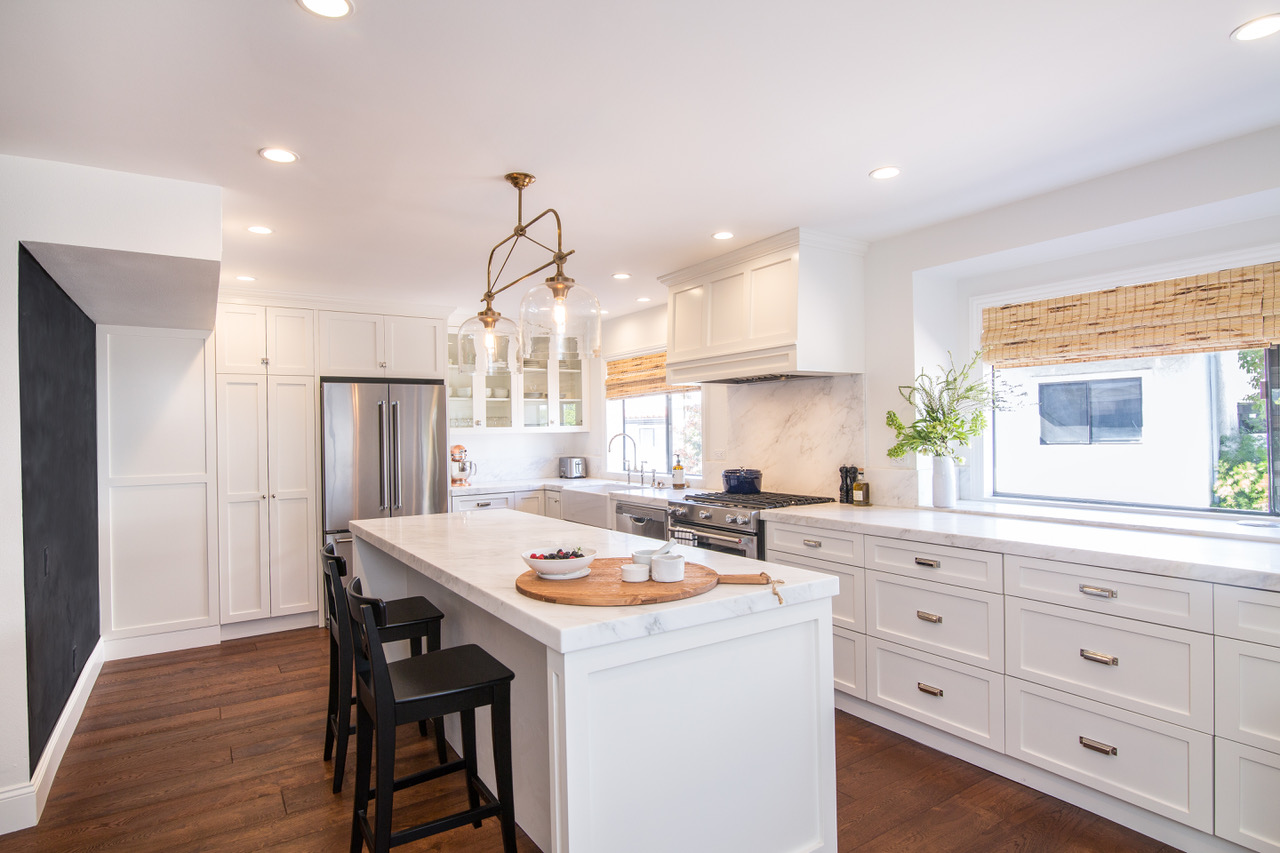 White Shaker & Carrera Marble Kitchen Remodel