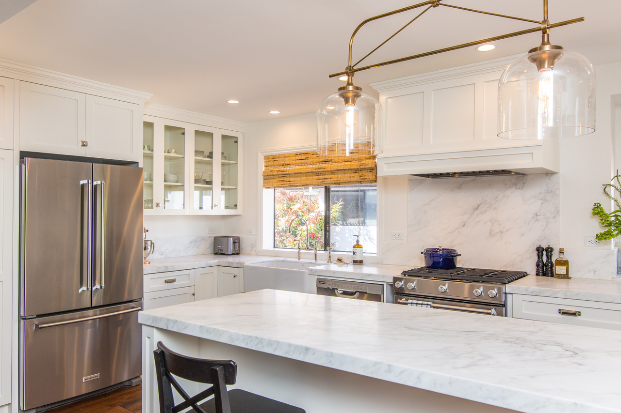 White Shaker & Carrera Marble Kitchen Remodel