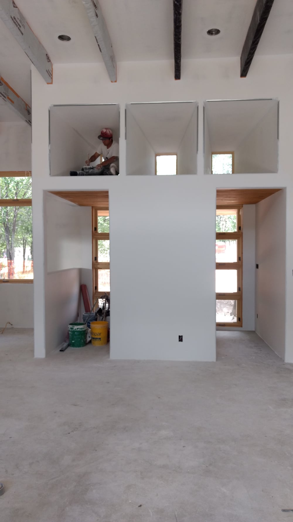 Painting inside Window Wells EDGE Architects