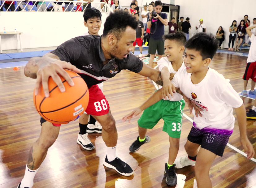 Phoenix PULSE Fuel Masters train young basketball players in Davao