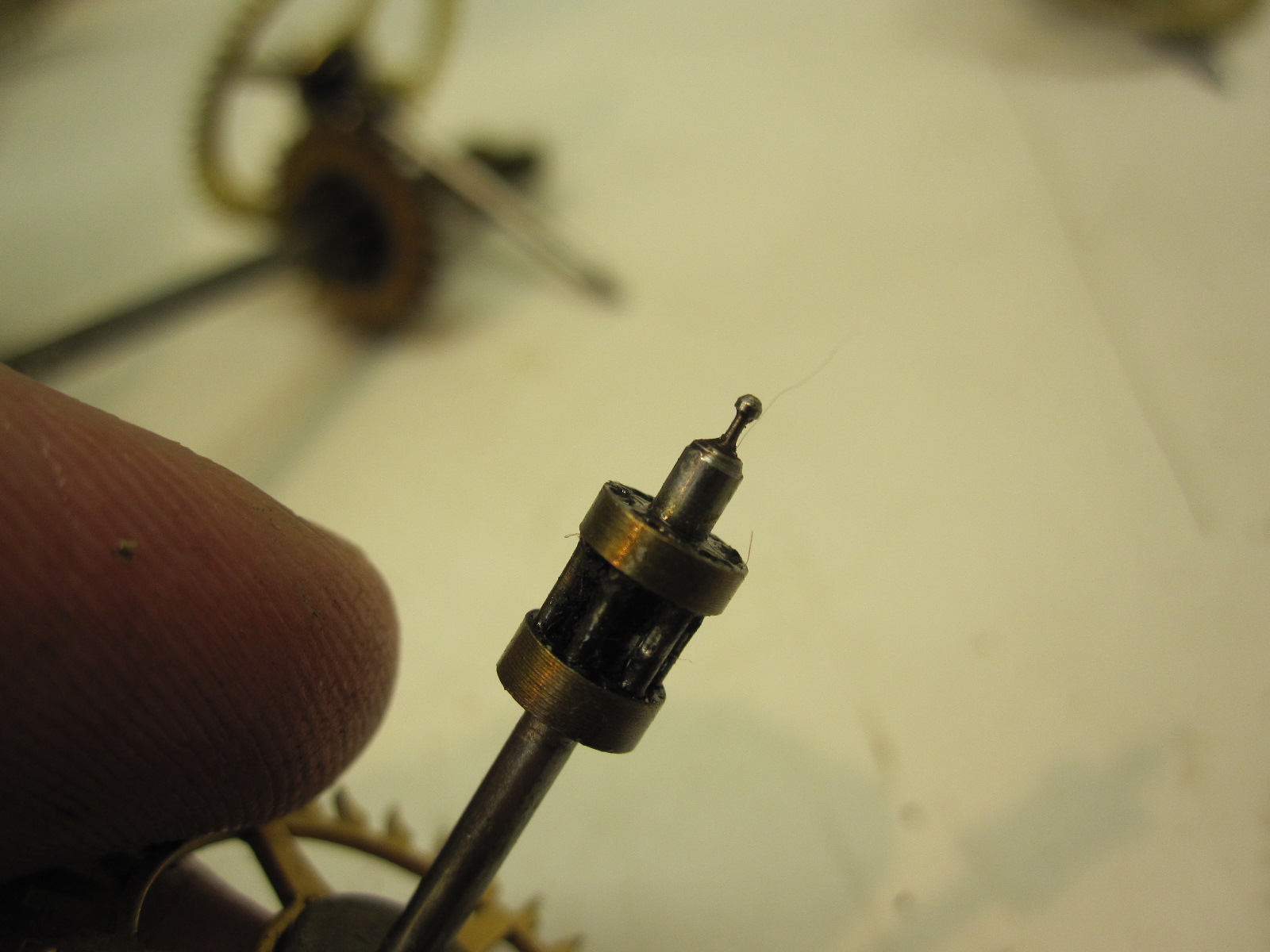 A very worn pivot Edina Clock Repair