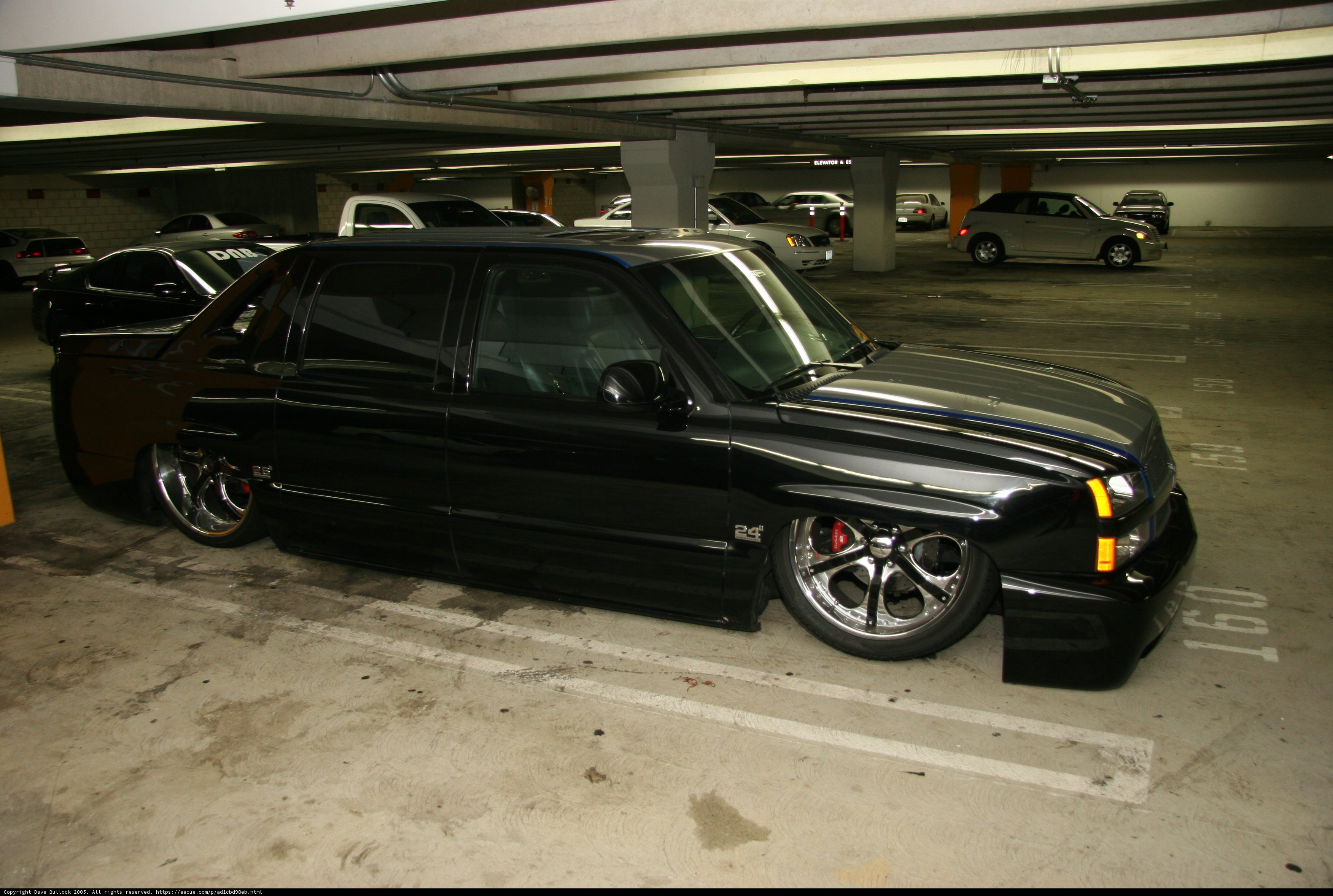Alloy Wheels on a Black Truck in a Parking Garage Dave Bullock