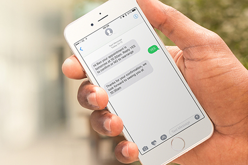 Hospital expands mobile phone appointment technology East Lancashire