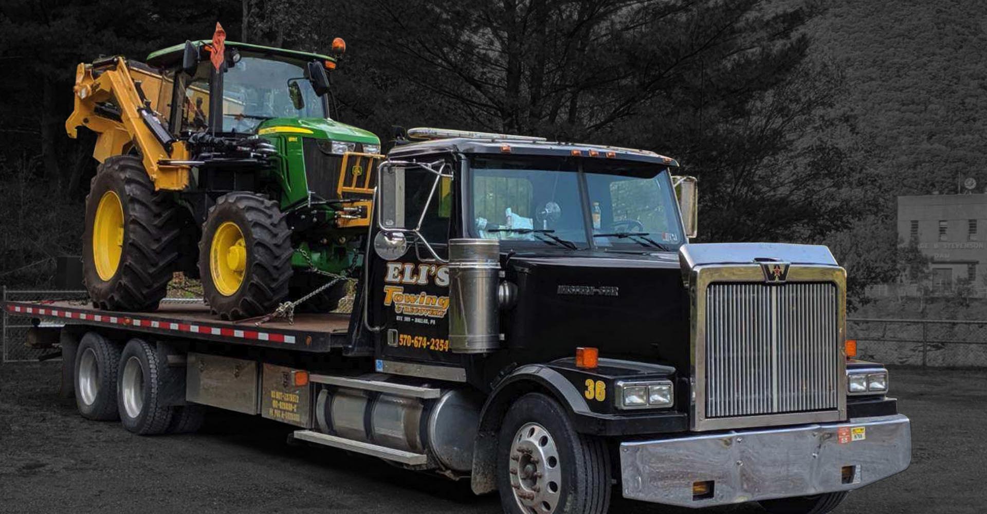 Small Equipment Hauling Eli's Towing