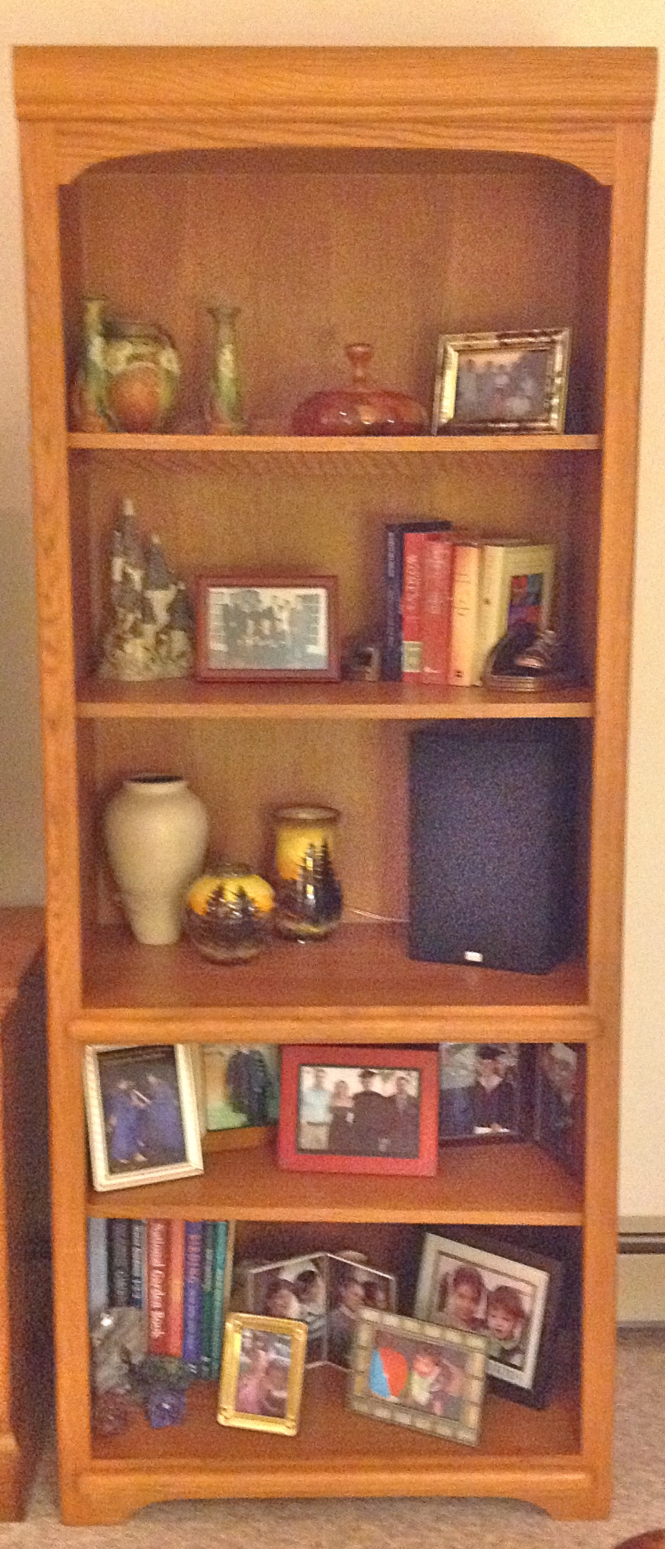 Shelf designing: TV speakers were added to the shelves instead of sitting on the floor.