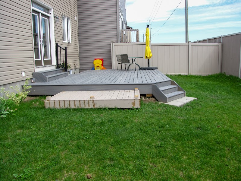 Composite Deck, Concrete Footing Empire Deck & Interlock