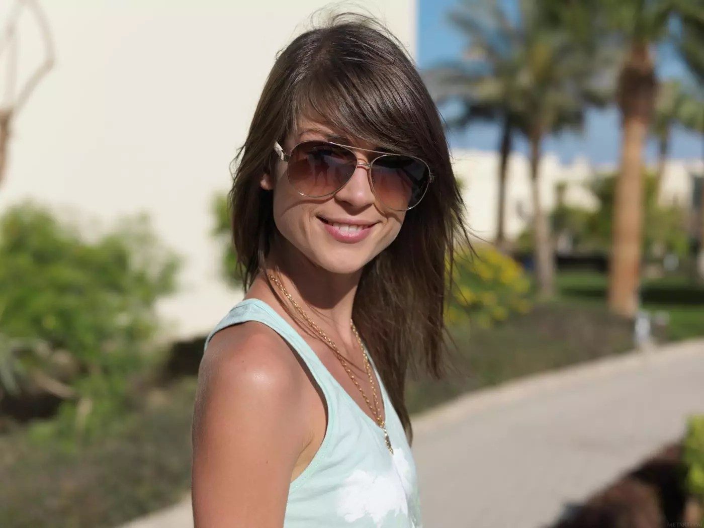 Adorable brunette girl Mia D is always smiling when she gets naked in