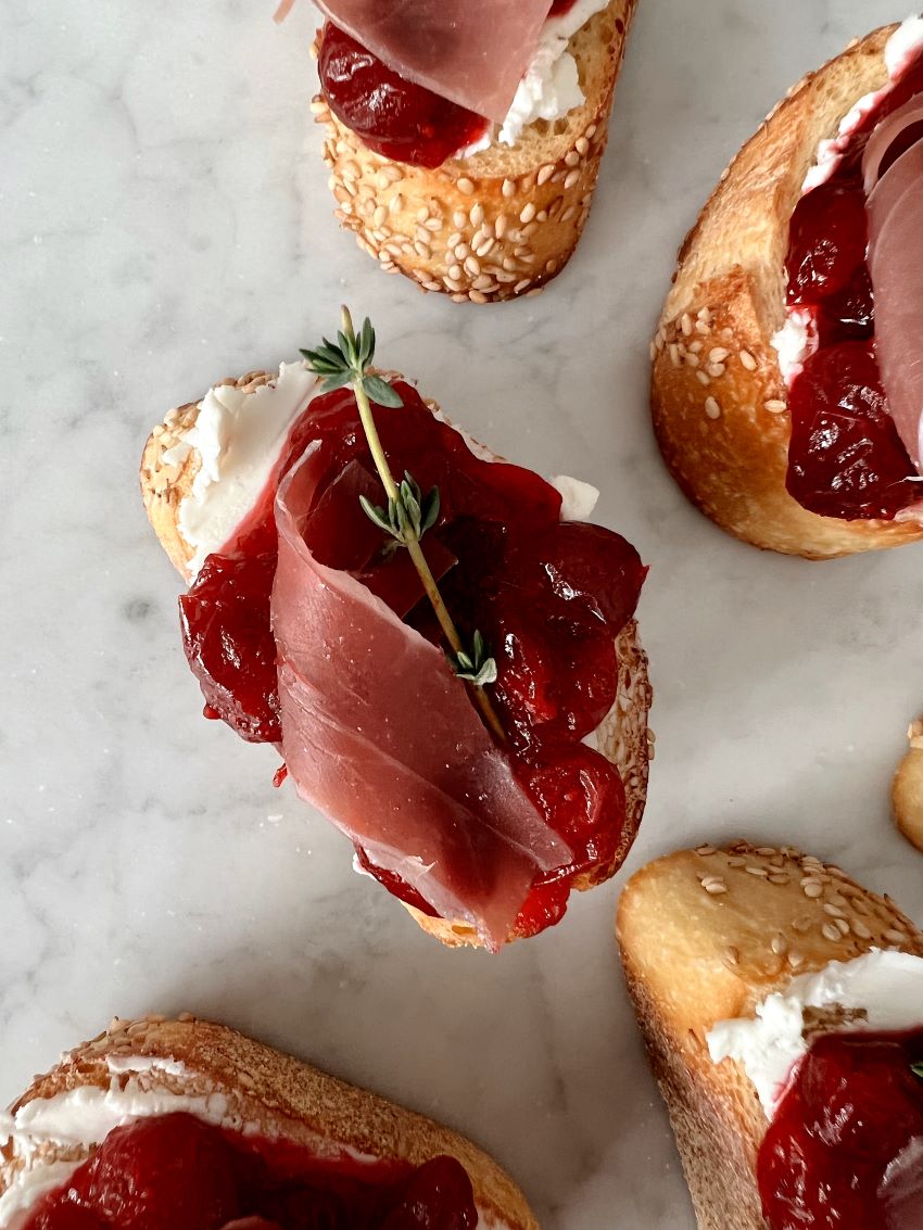 Cranberry Jam, Goat Cheese, and Prosciutto Crostini Endlessly Elated