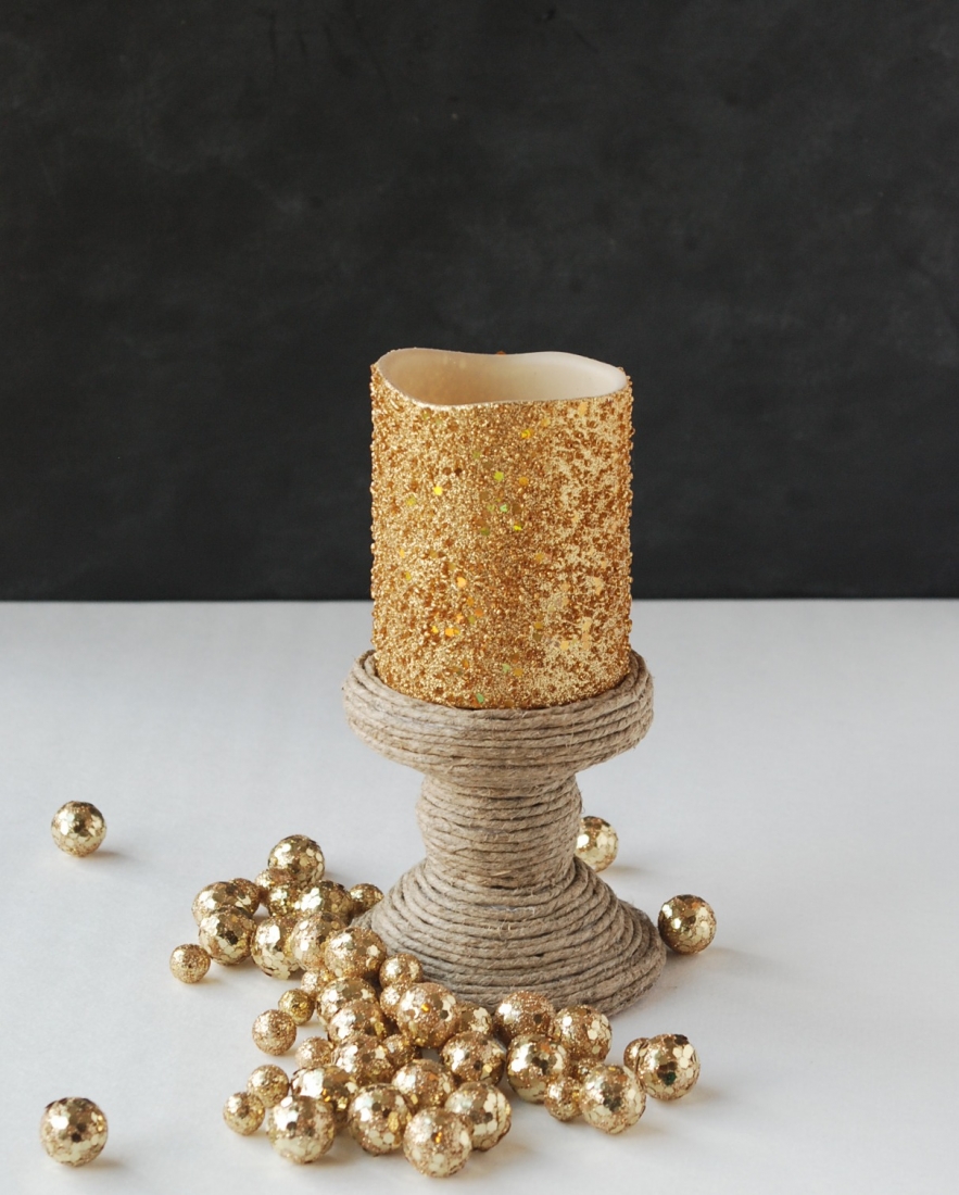 Make a jutewrapped candle holder out of a thriftstore find. Easy