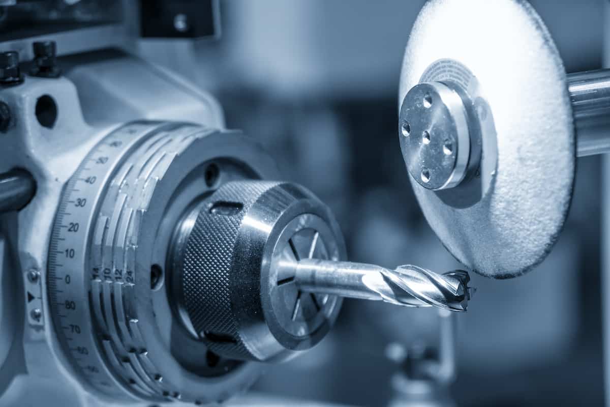 The operation of tool grinding machine control by CNC program.The CNC