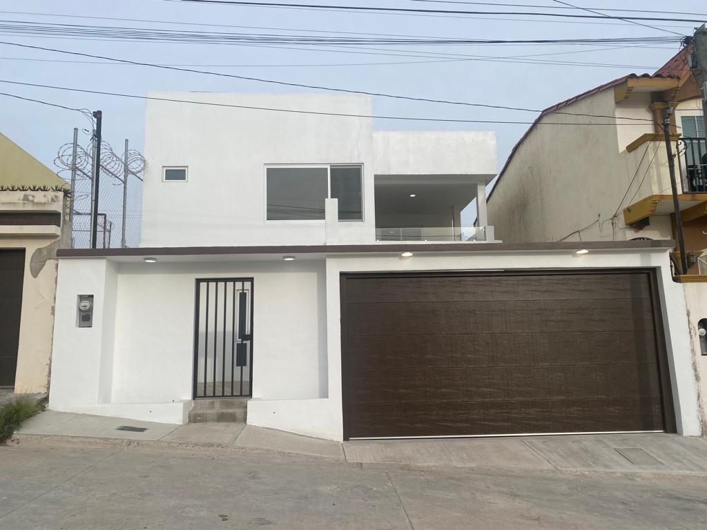 MODERNA Y AMPLIA CASA EN VENTA EN ROSARITO ER