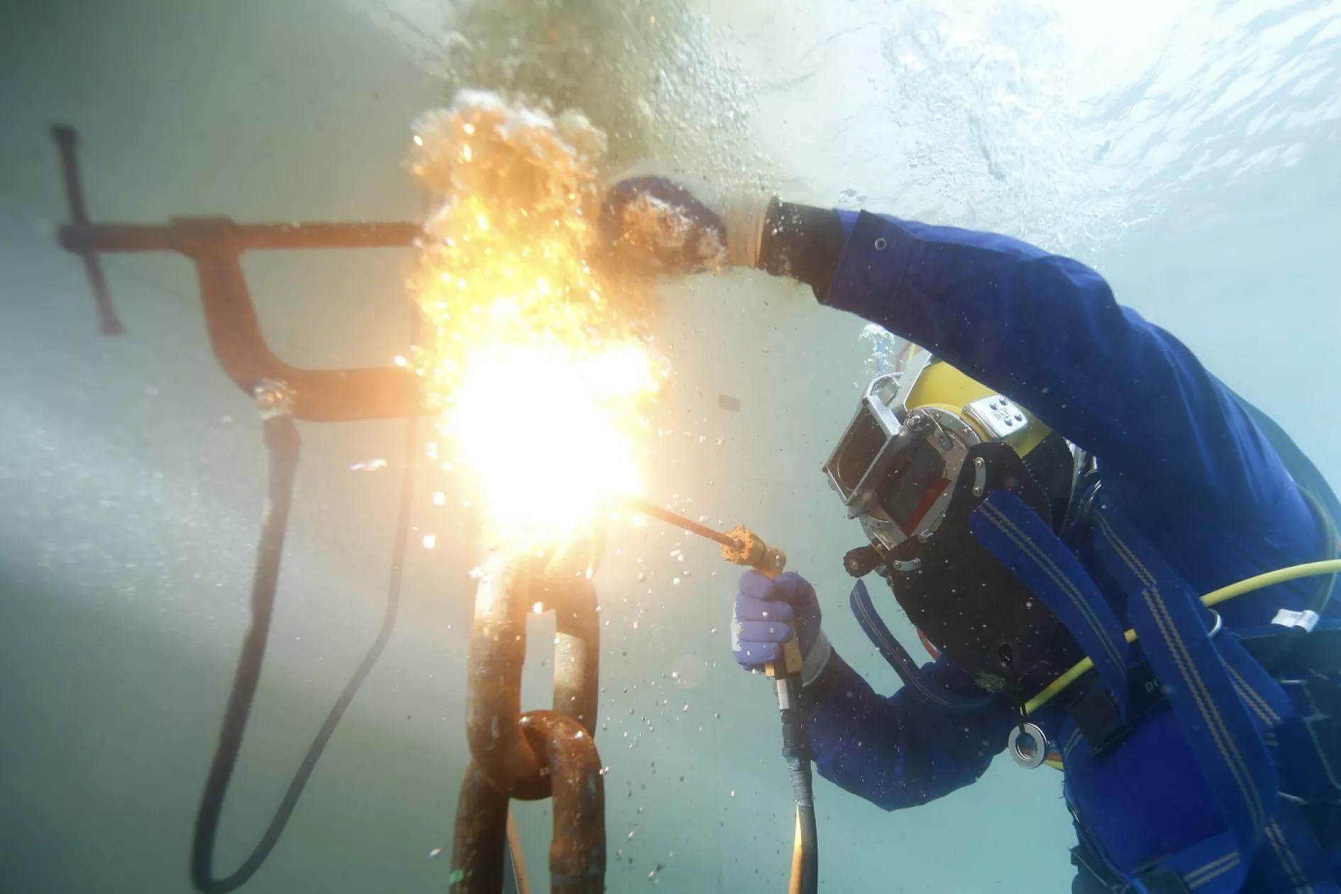 Welder's work underwater overview