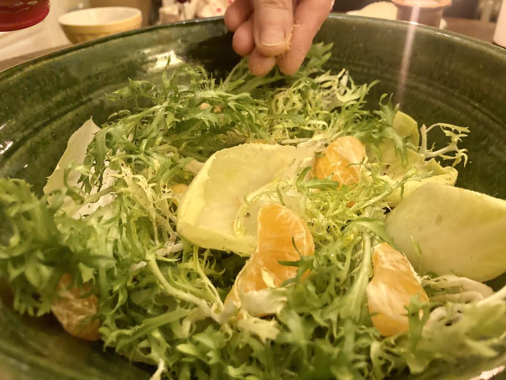 Bitter Greens and Mandarin Orange Dust Salad, with an Anchovy