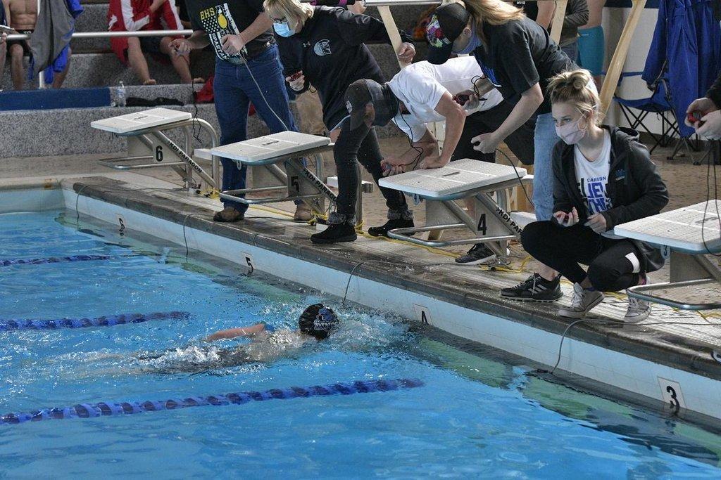 Lady Dino Swim Takes Region Title *Photo Gallery* ETV News