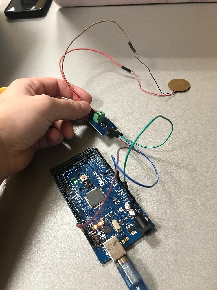 How can I convert the piezoelectric sensor output to Hertz? Sensors